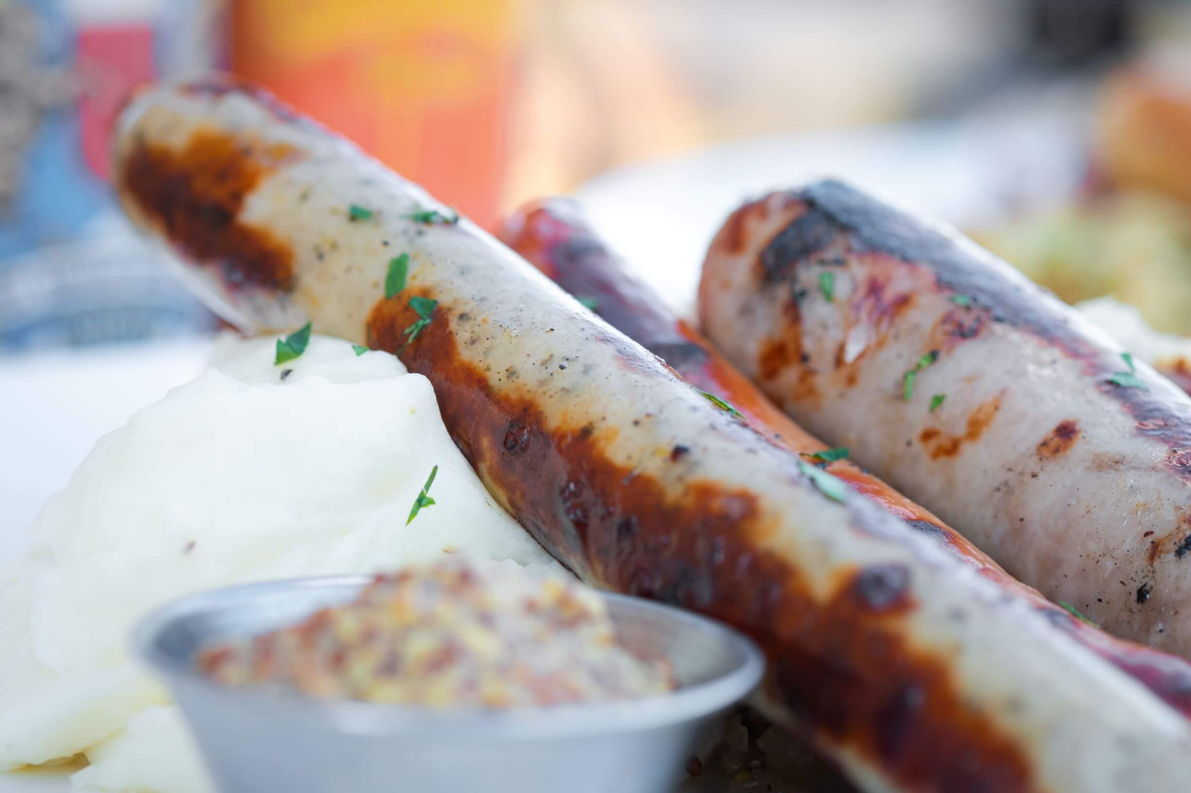 Wurstplatte with German sausages, whipped potatoes and mustard.